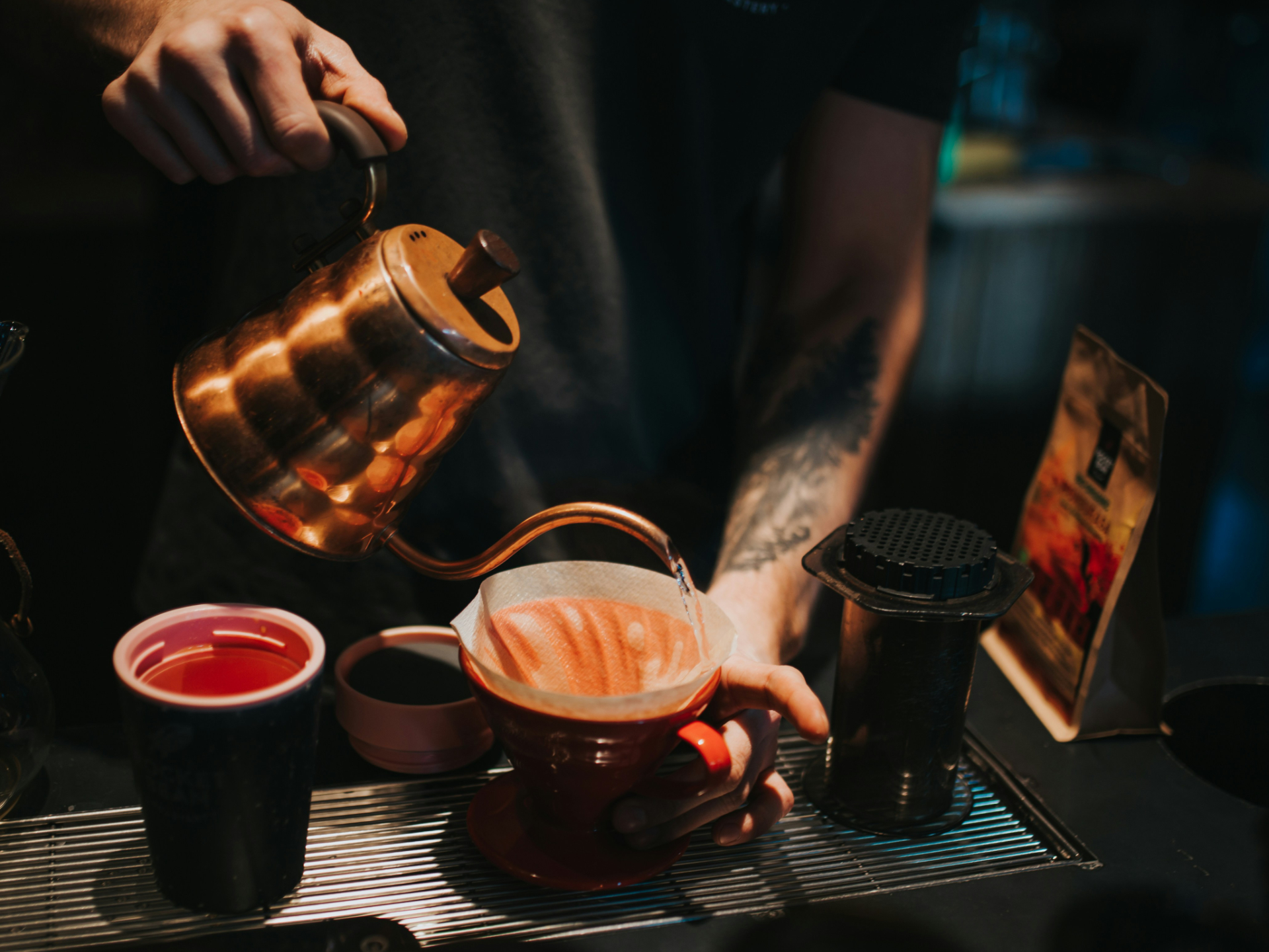 Preparing coffee with the V60. Photo by Krists Luhaers on Unsplash.