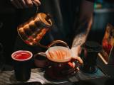 Preparing coffee with the V60. Photo by Krists Luhaers on Unsplash.